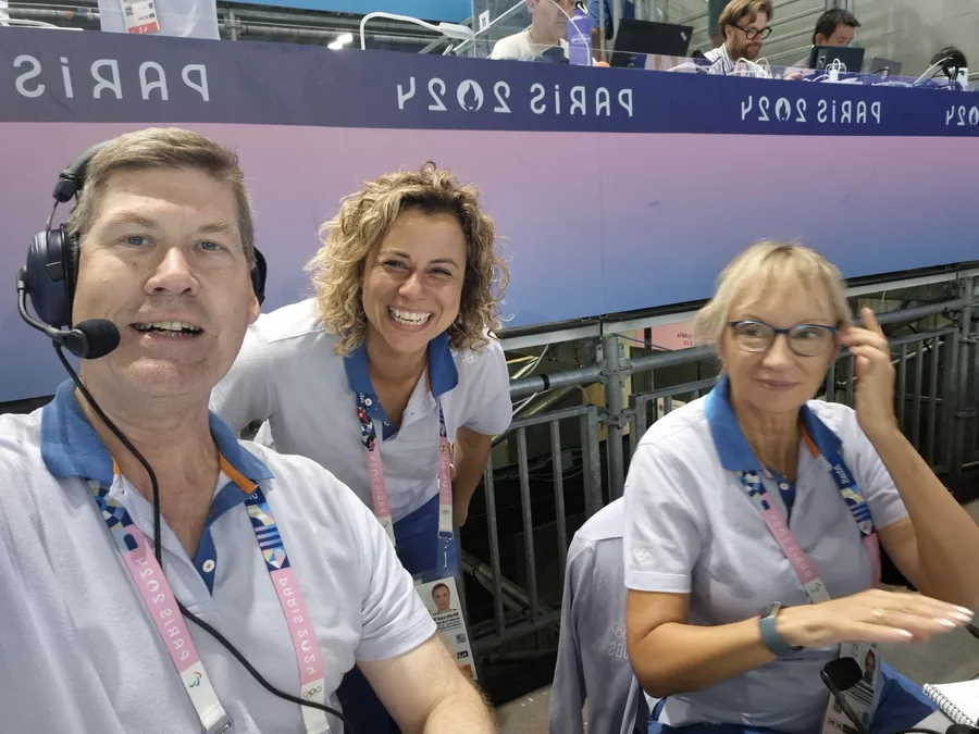 Hans Frauenlob in the Paris 2024 commentary position with fellow commentators.